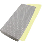 Grey dotted and yellow cotton jersey crib fitted sheets on a white background