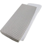 Grey dotted and white cotton jersey crib fitted sheets on a white background