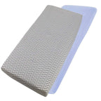 Grey chevron-patterned and blue cotton jersey crib fitted sheets on a white background