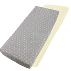 Grey dotted and cream cotton jersey crib fitted sheets on a white background