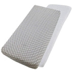 Grey star-patterned and white cotton jersey crib fitted sheets on a white background