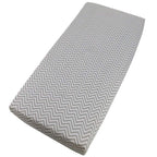Grey chevron-patterned cotton jersey crib fitted sheet on a white background