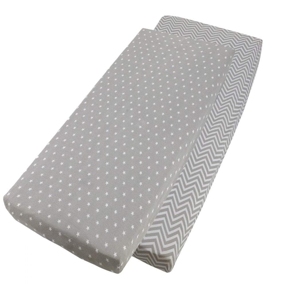 Grey chevron-patterned and grey cotton jersey crib fitted sheets on a white background
